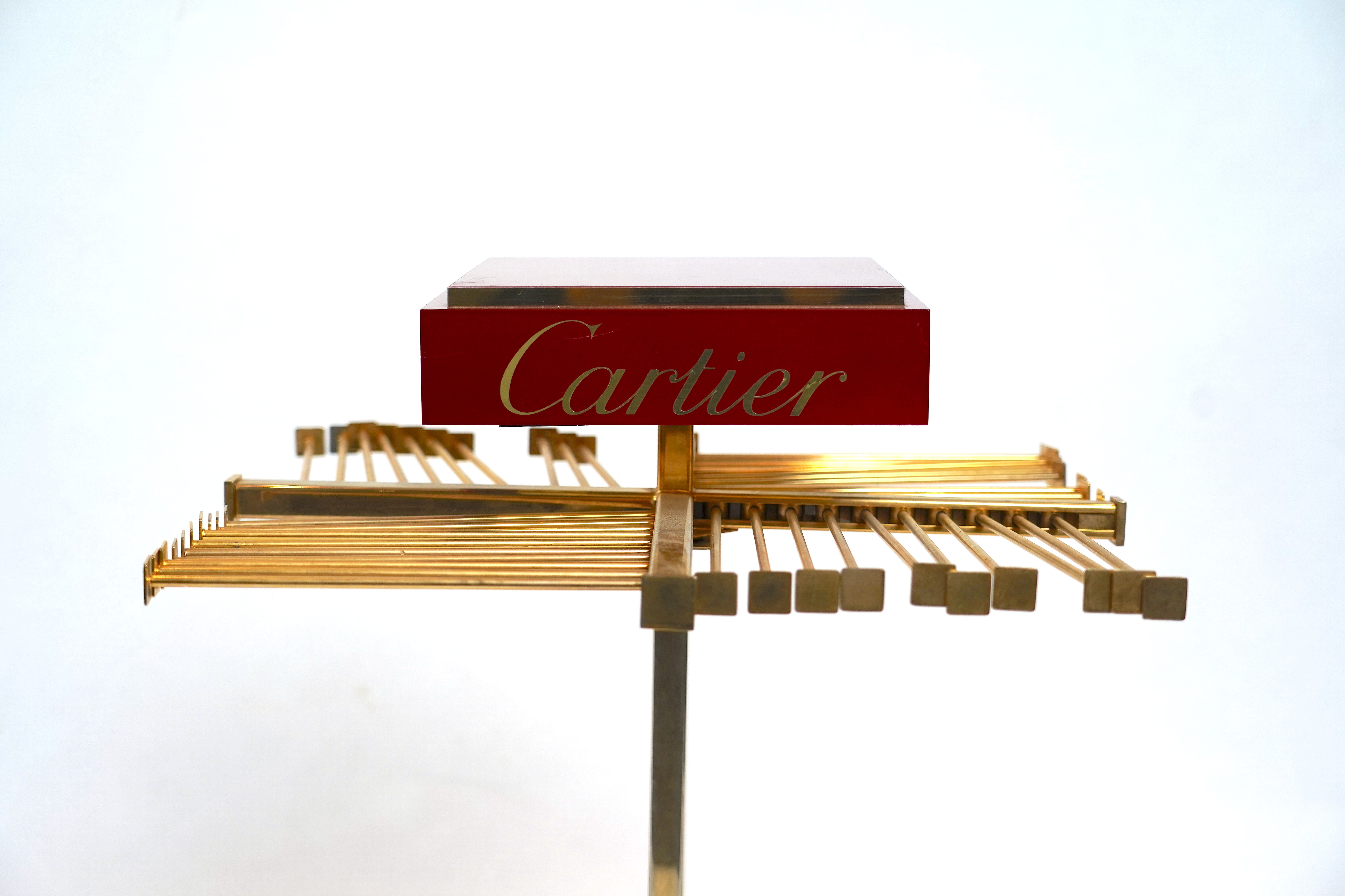 A Cartier vintage scarf rack.
